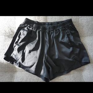 Lululemon Womens Satin Glossy Black Running Dolphin Shorts Size 6